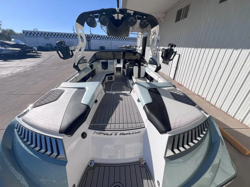 Slide: The Image of 2019 Nautique Super Air Nautique G25 boat with sleek design and spacious interior. - 10