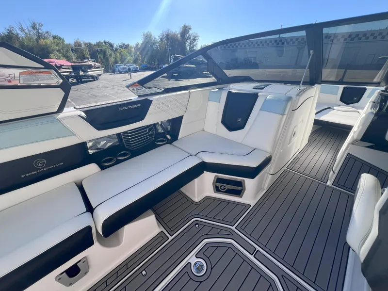 Slide: The Image of 2019 Nautique Super Air Nautique G25 interior with sleek seating and modern design. - 11