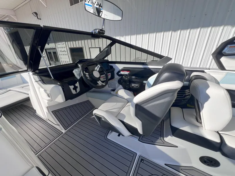 Slide: The Image of 2019 Nautique Super Air Nautique G25 interior with sleek design and modern controls. - 12