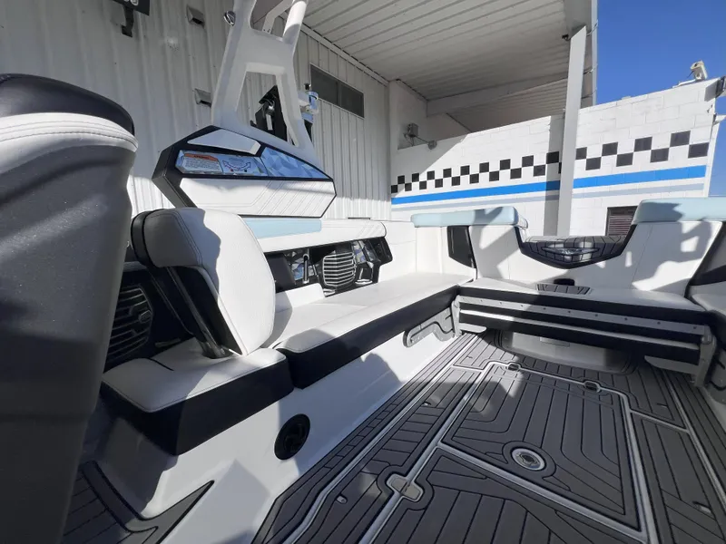 Slide: The Image of 2019 Nautique Super Air Nautique G25 interior with sleek seating and modern design. - 15