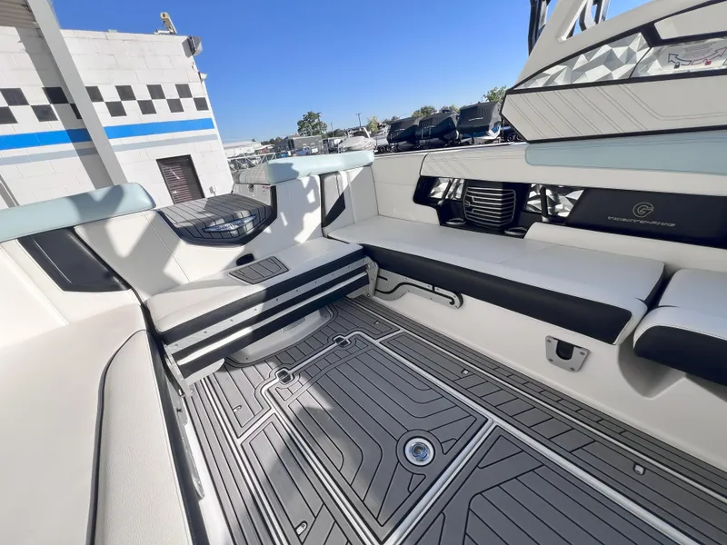 Slide: The Image of 2019 Nautique Super Air Nautique G25 interior with sleek seating and modern design. - 16