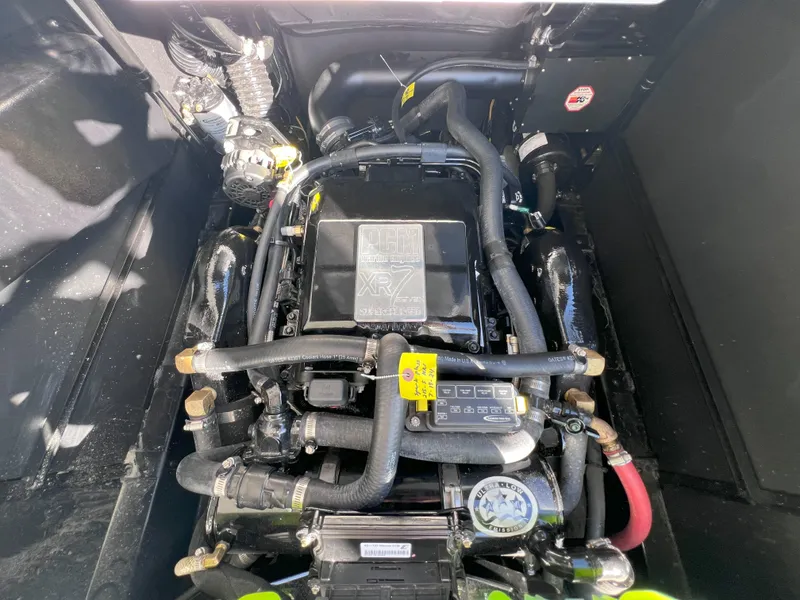 Slide: The Image of 2019 Nautique Super Air Nautique G25 engine compartment, showcasing intricate mechanical components. - 17
