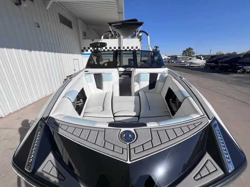 Slide: The Image of 2019 Nautique Super Air Nautique G25 boat with sleek design and spacious seating. - 3