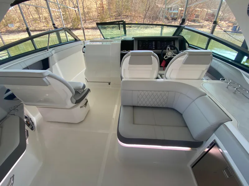 Slide: The Image of 2023 Sea Ray SLX 400 OB interior with modern seating and sleek design. - 20