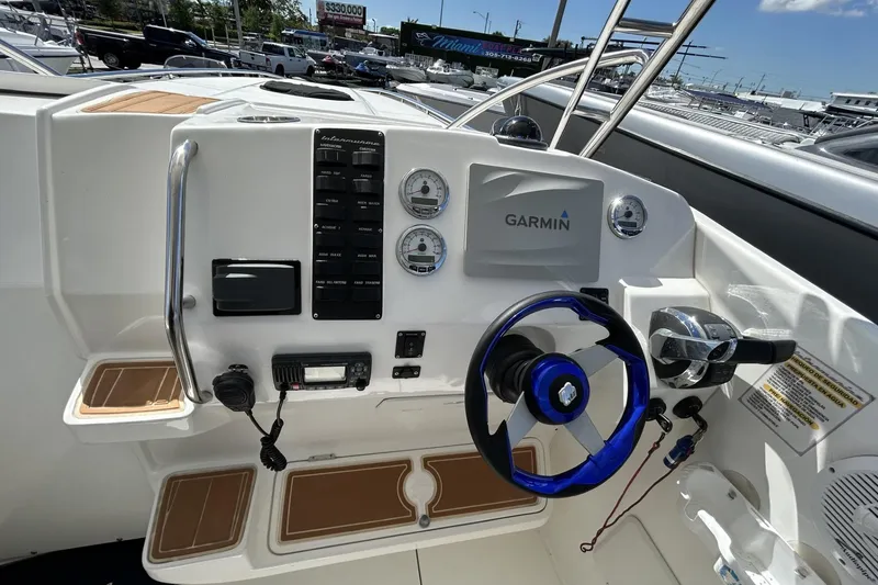 Slide: The Image of Cockpit of 2018 Intermarine 380 Sport boat with Garmin navigation system and modern controls. - 21
