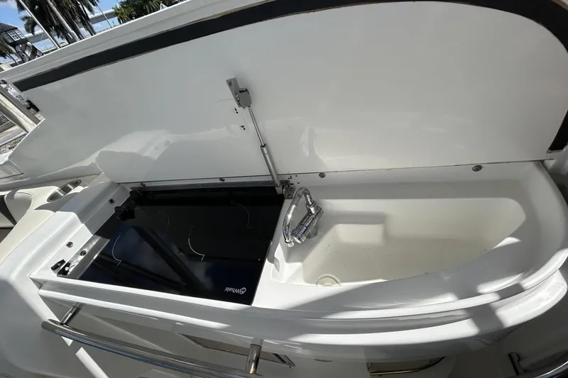 Slide: The Image of Open kitchenette on 2018 Intermarine 380 Sport yacht with stove and sink. - 23