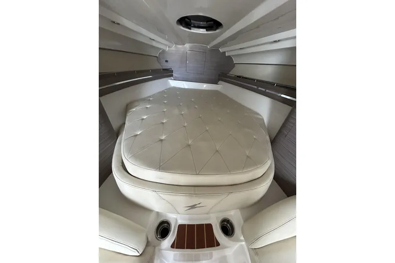 Slide: The Image of Interior of 2018 Intermarine 380 Sport boat with luxurious white seating. - 28