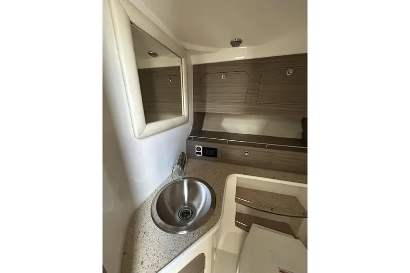 Slide: The Image of 2018 Intermarine 380 Sport yacht interior with sink and storage cabinets. - 30
