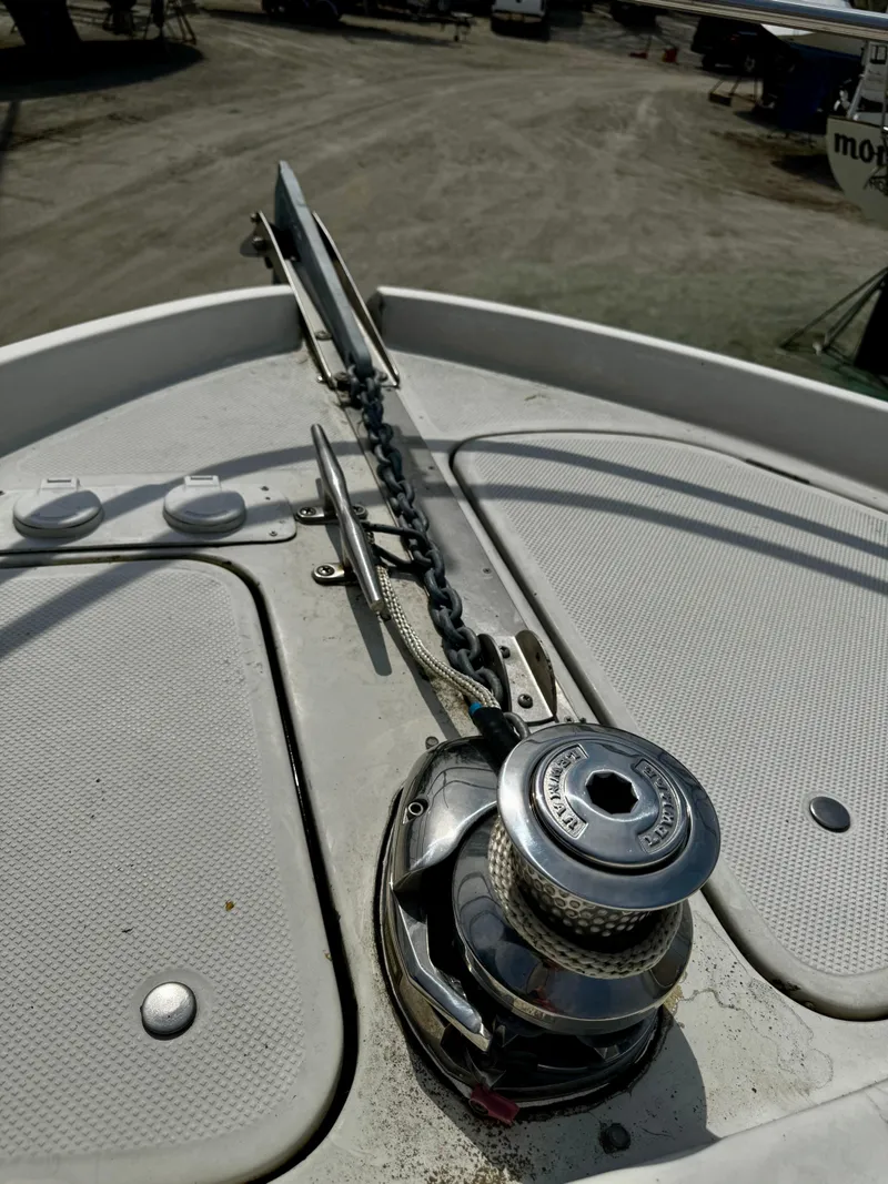 Slide: The Image of Anchor chain and winch on 1998 Maxum 4100 SCA boat deck. - 17