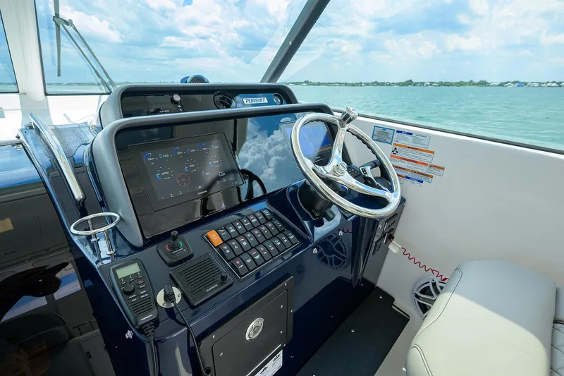 Slide: The Image of Pursuit 38 OUTTA HERE - Helm Station - 20