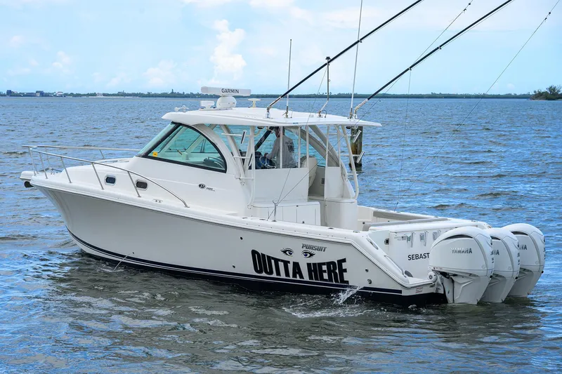 Slide: The Image of Pursuit 38 OUTTA HERE - Port Aft Profile - 38