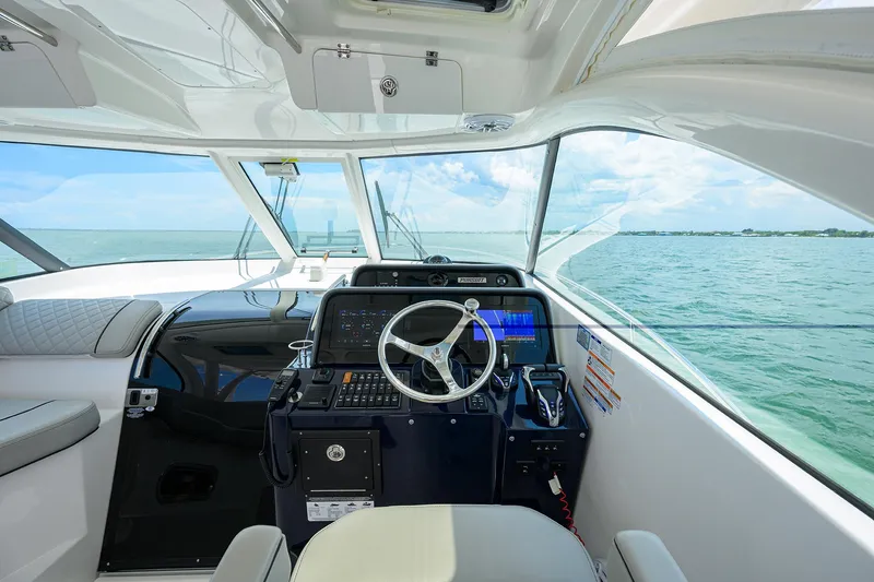 Slide: The Image of Pursuit 38 OUTTA HERE - Helm Station - 4