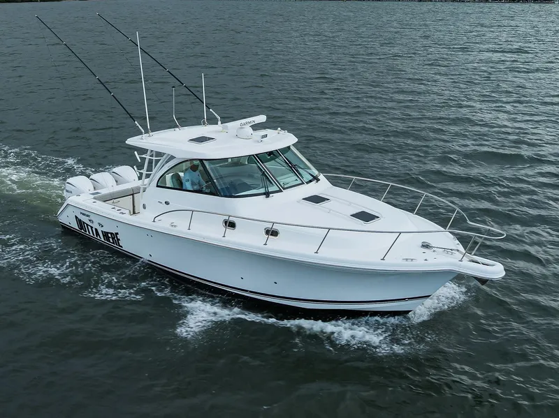 Slide: The Image of Pursuit 38 OUTTA HERE - Starboard Bow Aerial Profile - 41