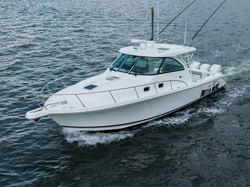 Slide: The Image of Pursuit 38 OUTTA HERE - Port Bow Aerial Profile - 42