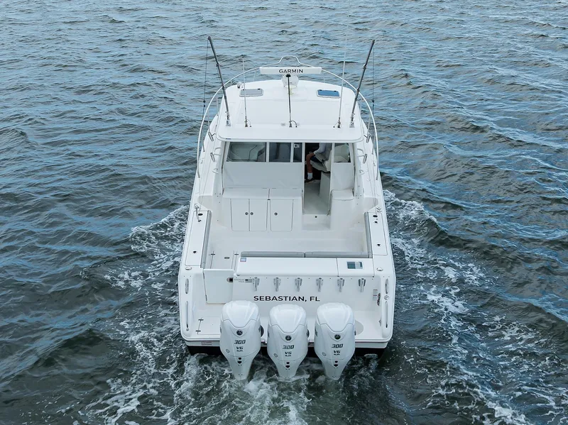 Slide: The Image of Pursuit 38 OUTTA HERE - Aft Aerial Profile - 44