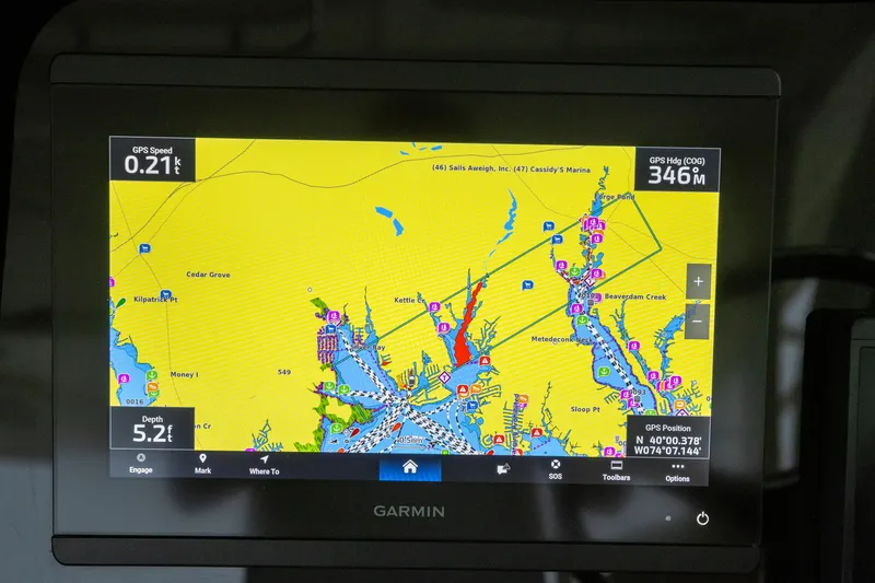 Slide: The Image of Garmin GPS display on 2018 Pursuit OS 385 Offshore, showing navigation map and speed. - 39