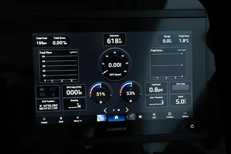 Slide: The Image of Garmin marine display on 2018 Pursuit OS 385 Offshore, showing fuel and navigation data. - 40
