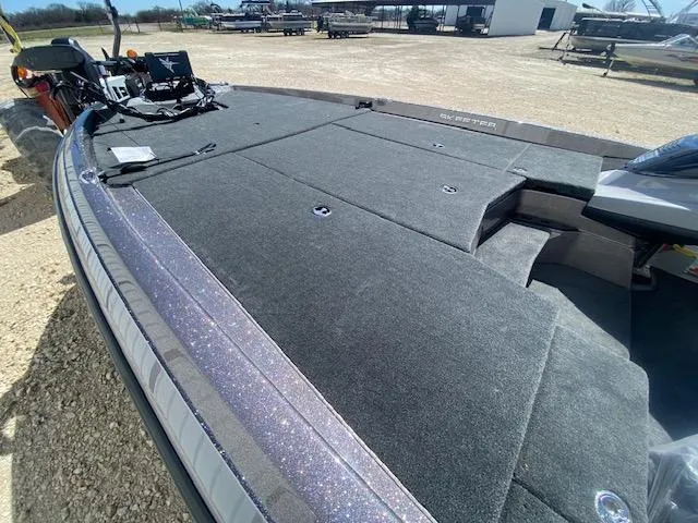 Slide: The Image of 2025 Skeeter ZXR21 boat with spacious deck and modern design. - 12