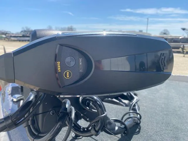 Slide: The Image of 2025 Skeeter ZXR21 boat motor with advanced control panel, outdoor setting. - 13