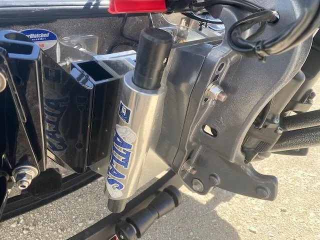 Slide: The Image of 2025 Skeeter ZXR21 boat engine mount with hydraulic steering components. - 9