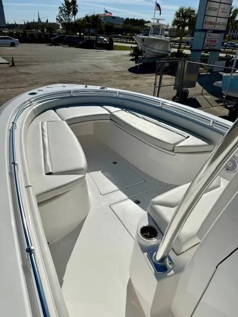 Slide: The Image of 2024 Contender 24 Sport boat with spacious seating and sleek design. - 7