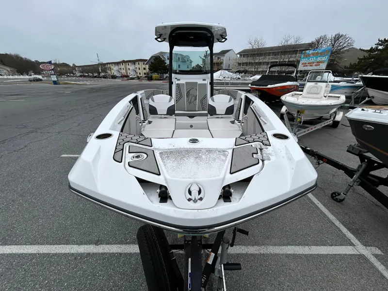 Slide: The Image of 2020 Scarab 255 Open ID boat in parking lot, front view. - 8