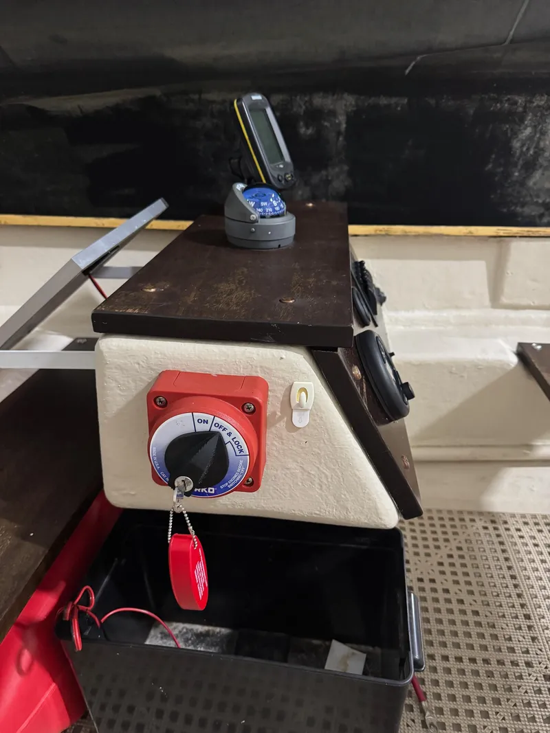 Slide: The Image of Control panel of a 1988 Stur-Dee Amesbury Dory boat with navigation equipment. - 7