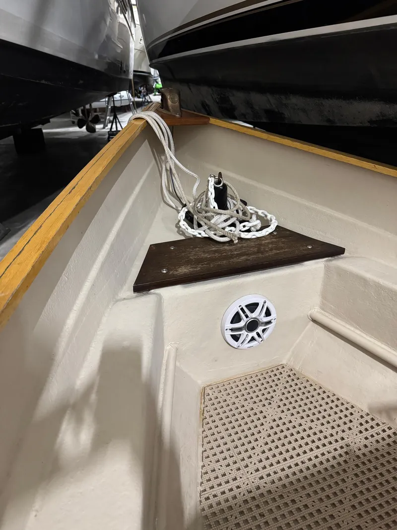 Slide: The Image of 1988 Stur-Dee Amesbury Dory 14' interior with rope and speaker detail. - 9