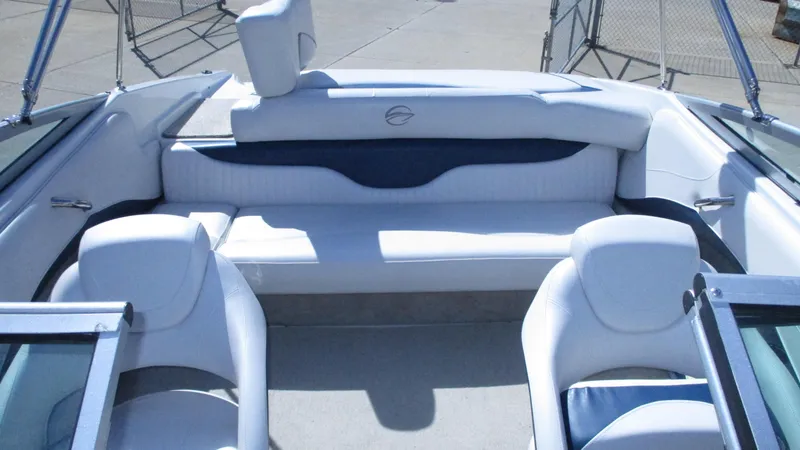 Slide: The Image of Interior view of a 2012 Crownline 21 SS boat with white seating. - 4