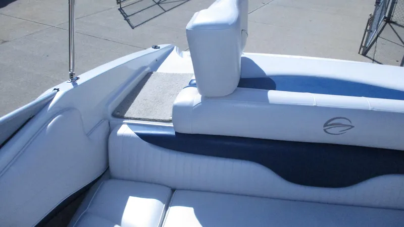Slide: The Image of Interior of 2012 Crownline 21 SS boat with steering wheel and seating. - 6