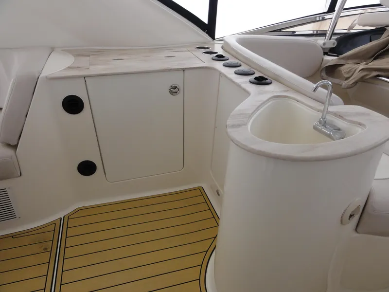 Slide: The Image of 2009 Meridian 441 Sedan yacht interior with sink and storage area. - 24