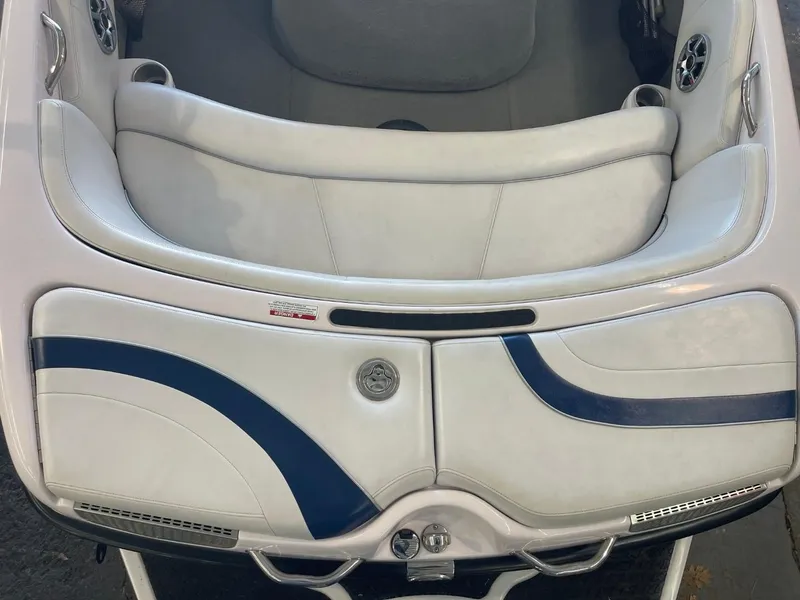 Slide: The Image of 2006 Nautique Ski 206 boat interior with white and blue seating. - 14