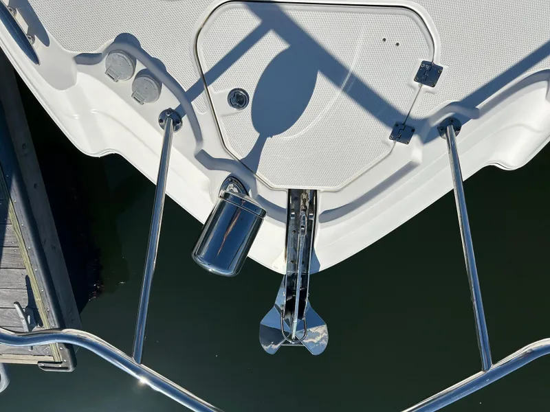 Slide: The Image of Bow of 2014 Chaparral 310 Signature boat with anchor and stainless steel fittings. - 11