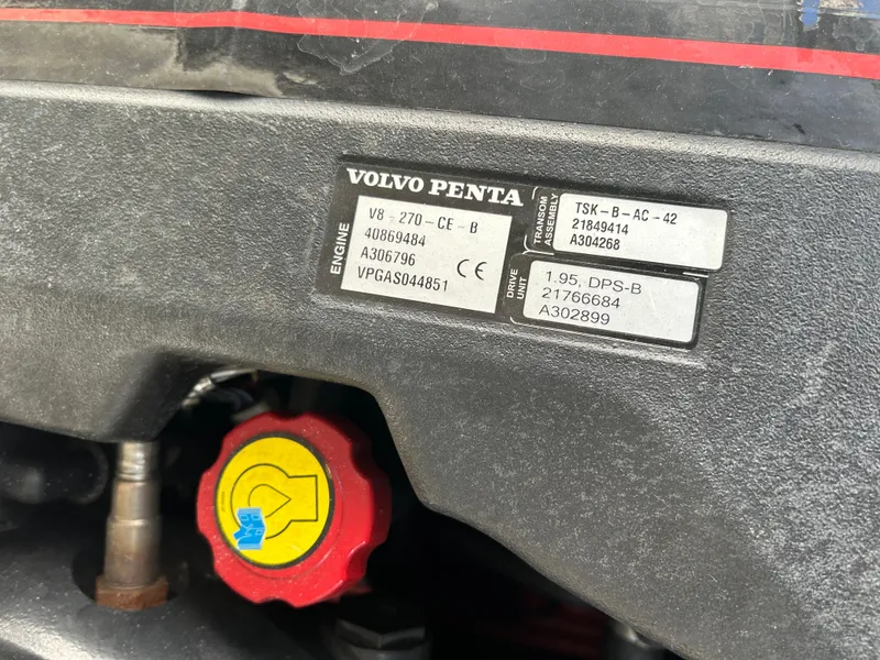 Slide: The Image of Volvo Penta engine label on 2014 Chaparral 310 Signature boat. - 35