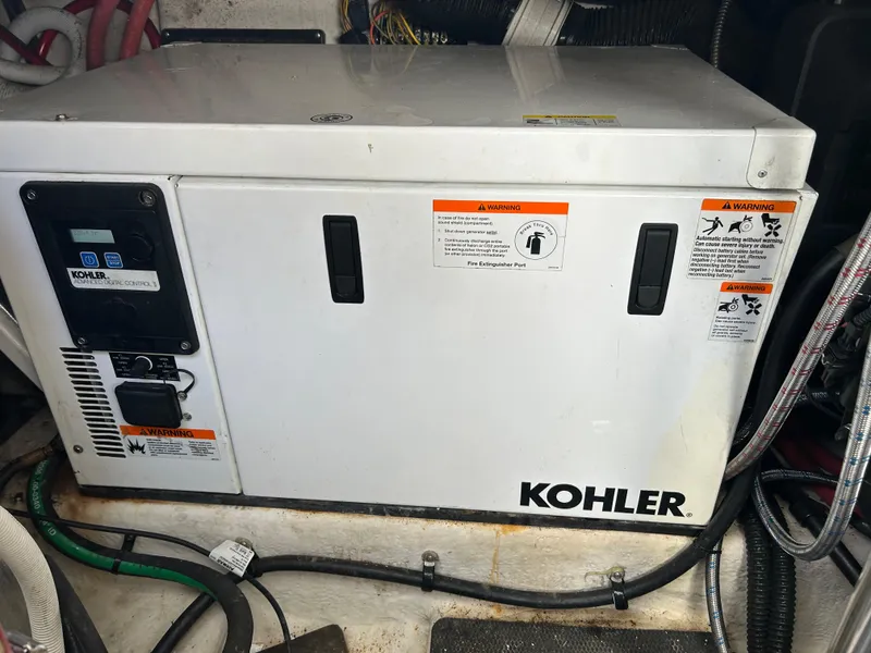 Slide: The Image of Kohler generator in 2014 Chaparral 310 Signature boat engine room. - 36