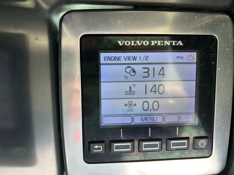 Slide: The Image of Volvo Penta engine display on 2014 Chaparral 310 Signature, showing engine metrics. - 41