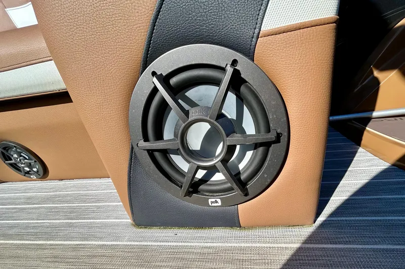 Slide: The Image of Speaker system in a 2021 Berkshire 25RFX DC STS 3.0+ boat interior. - 13