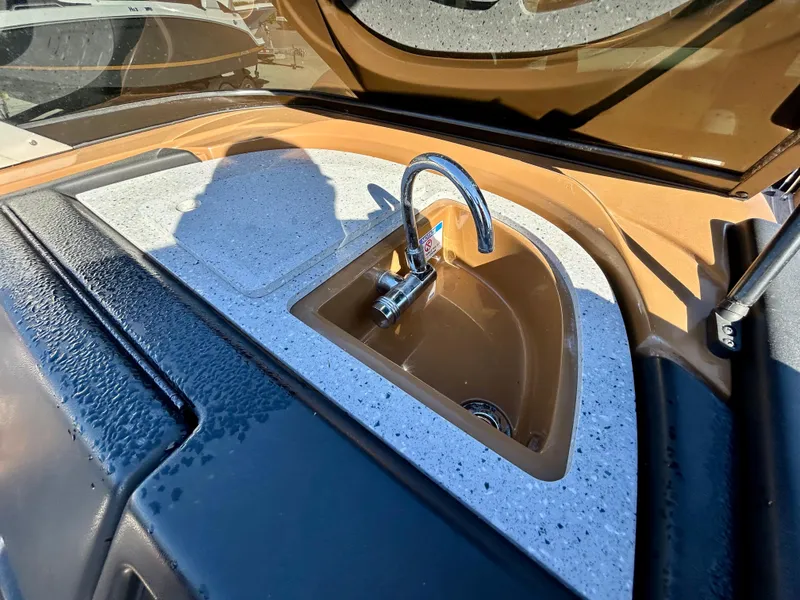 Slide: The Image of 2021 Berkshire 25RFX DC STS 3.0+ boat sink with modern faucet design. - 17