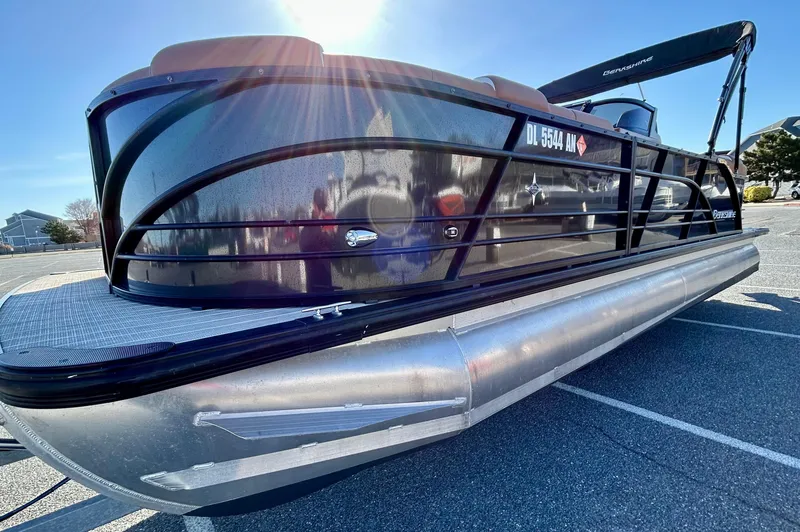 Slide: The Image of 2021 Berkshire 25RFX DC STS 3.0+ pontoon boat in sunlight, parked on pavement. - 5