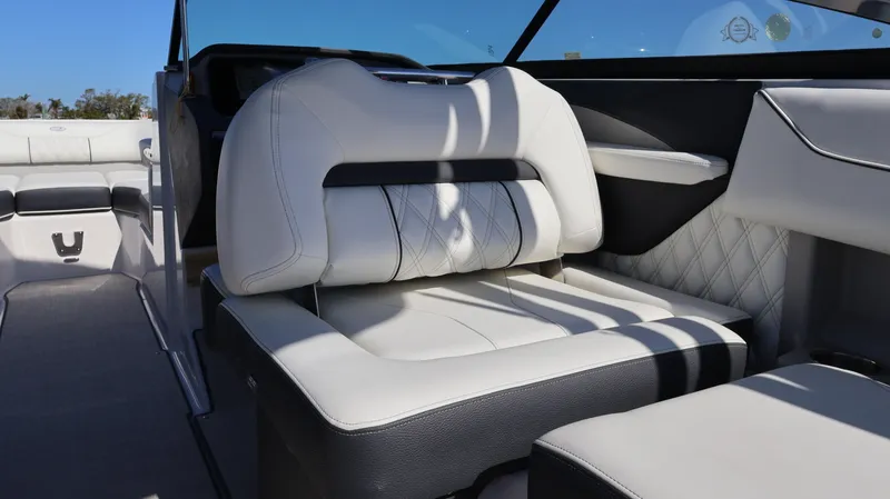 Slide: The Image of 2022 Regal LX4 boat interior with luxurious white leather seating and modern design. - 35