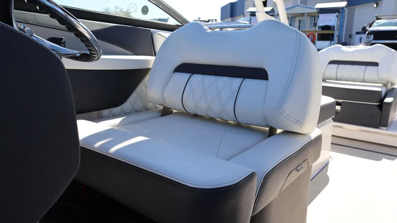 Slide: The Image of 2022 Regal LX4 boat interior with luxurious white seating and modern design. - 36