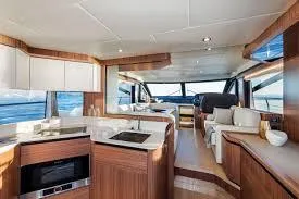 Slide: The Image of Luxurious interior of 2019 Absolute 50 Fly yacht with modern kitchen and seating area. - 31