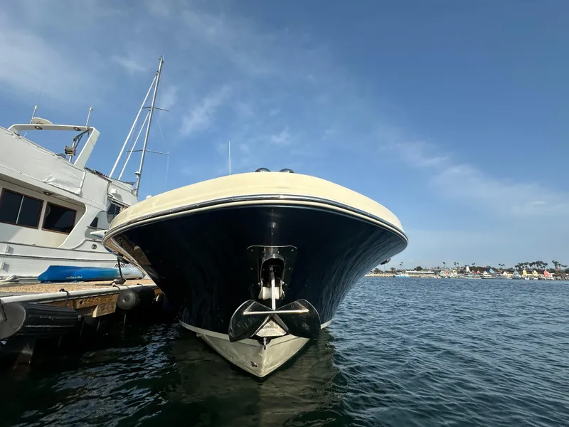Slide: The Image of A 2021 Chris-Craft Catalina 34 is docked. The sky is clear and blue. - 3
