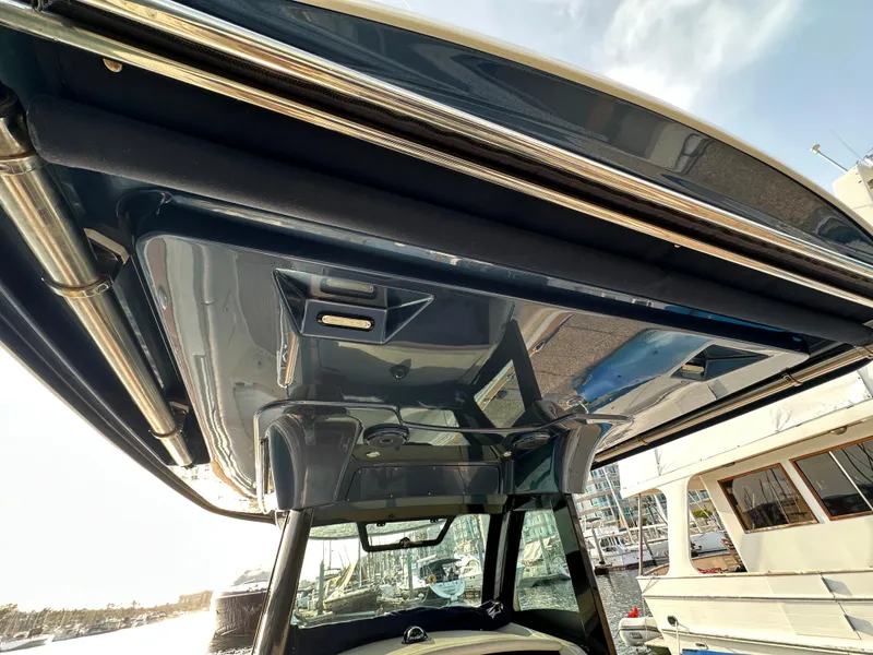 Slide: The Image of View of the roof of a 2021 Chris-Craft Catalina 34 boat at the marina. - 30