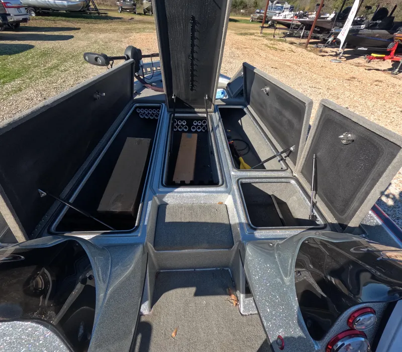 Slide: The Image of 2013 Legend Boats A211 with open storage compartments, showcasing interior layout. - 5