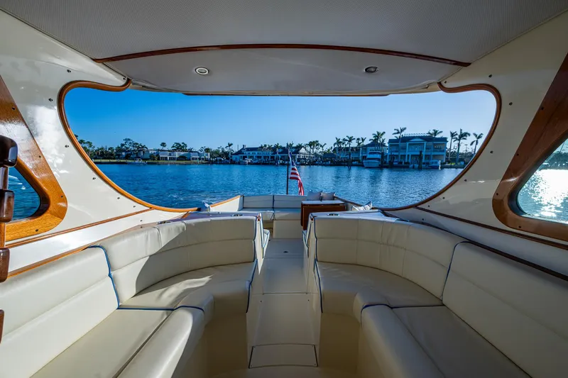 Slide: The Image of 2016 Hinckley Talaria 34 yacht interior with waterfront view. - 11