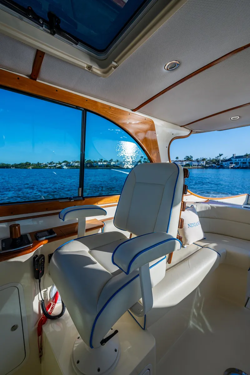 Slide: The Image of Interior of 2016 Hinckley Talaria 34 yacht with luxurious seating and scenic water view. - 17