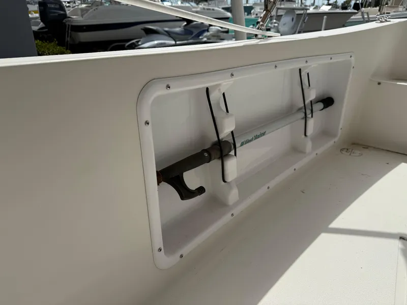 Slide: The Image of Atlas Boat Works Pompano 23, 2015 model, interior rod holder detail. - 12
