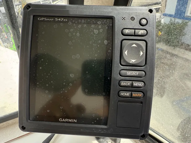 Slide: The Image of Garmin GPSMAP 547xs on 2015 Atlas Boat Works Pompano 23 dashboard. - 15