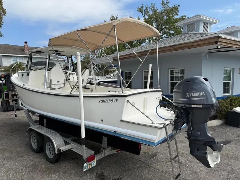 Slide: The Image of 2015 Atlas Boat Works Pompano 23 on trailer with Yamaha outboard motor. - 4